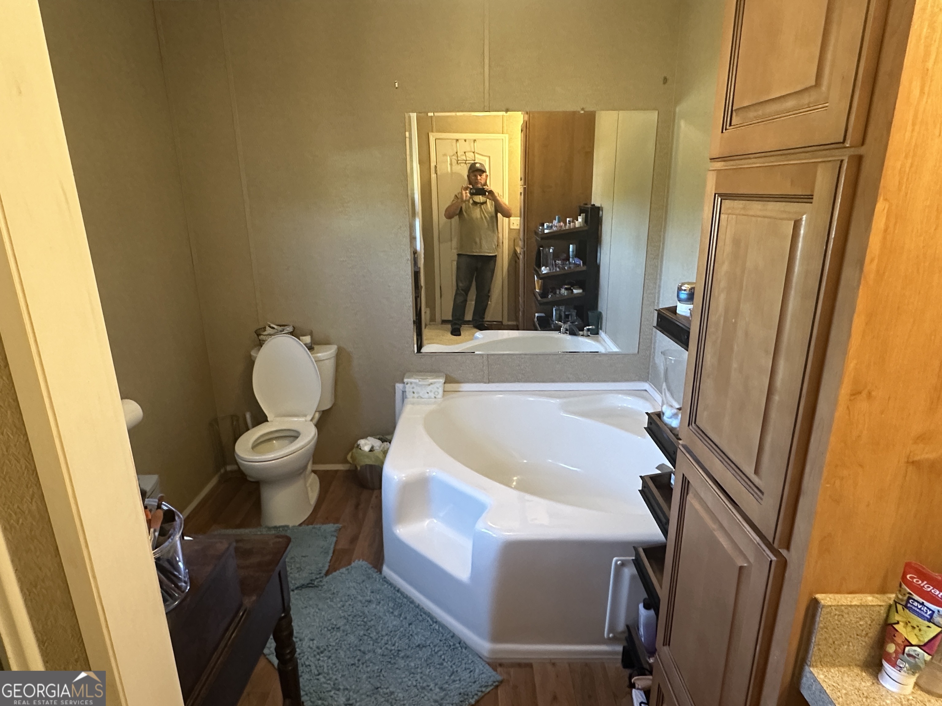 208 Oak Grove Lane Sylvania, GA 30467 - Photo 11 of 31 a bathroom with a sink and a bathtub