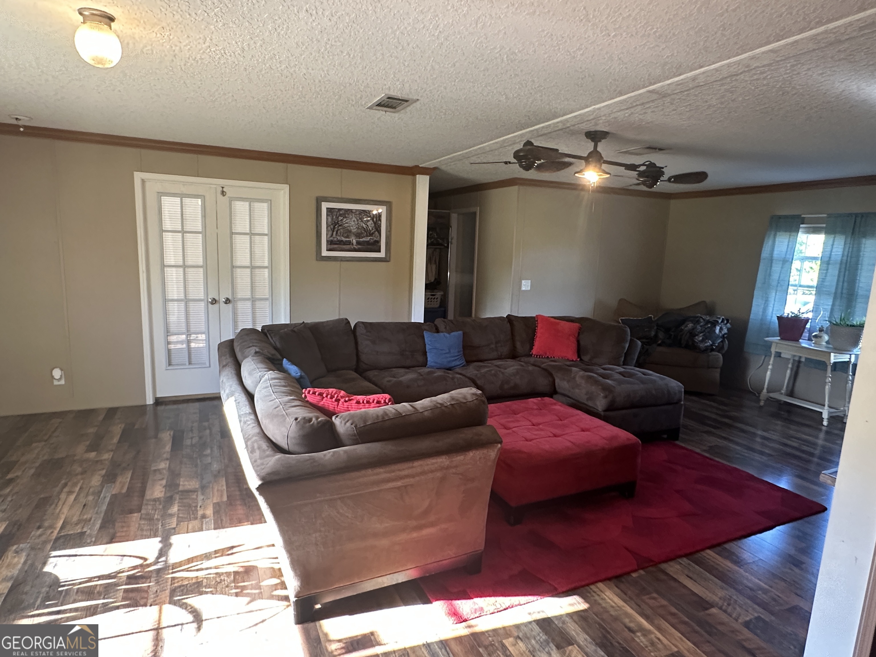 208 Oak Grove Lane Sylvania, GA 30467 - Photo 12 of 31 a living room with furniture