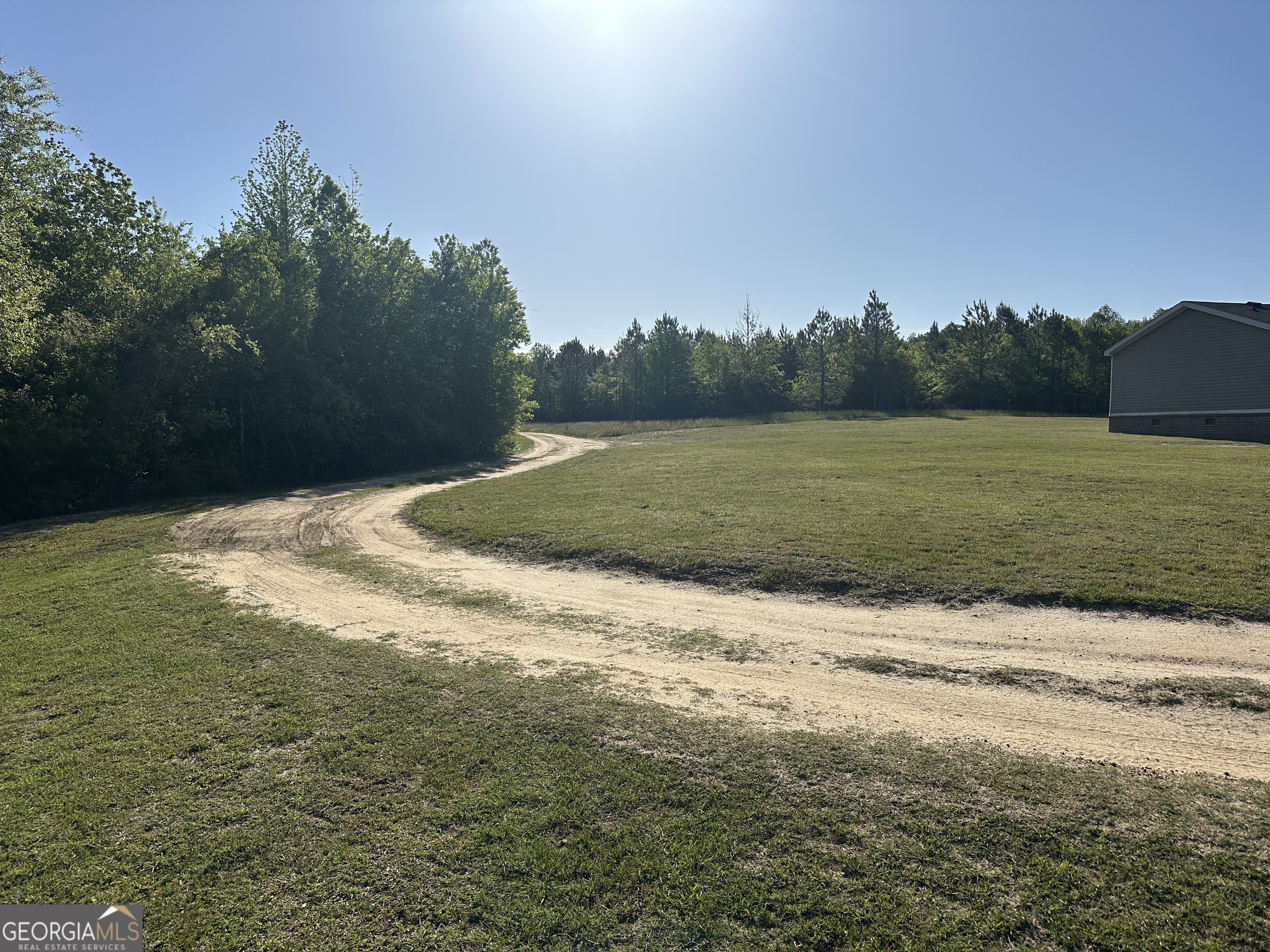 208 Oak Grove Lane Sylvania, GA 30467 - Photo 15 of 31 a view of a field with an ocean