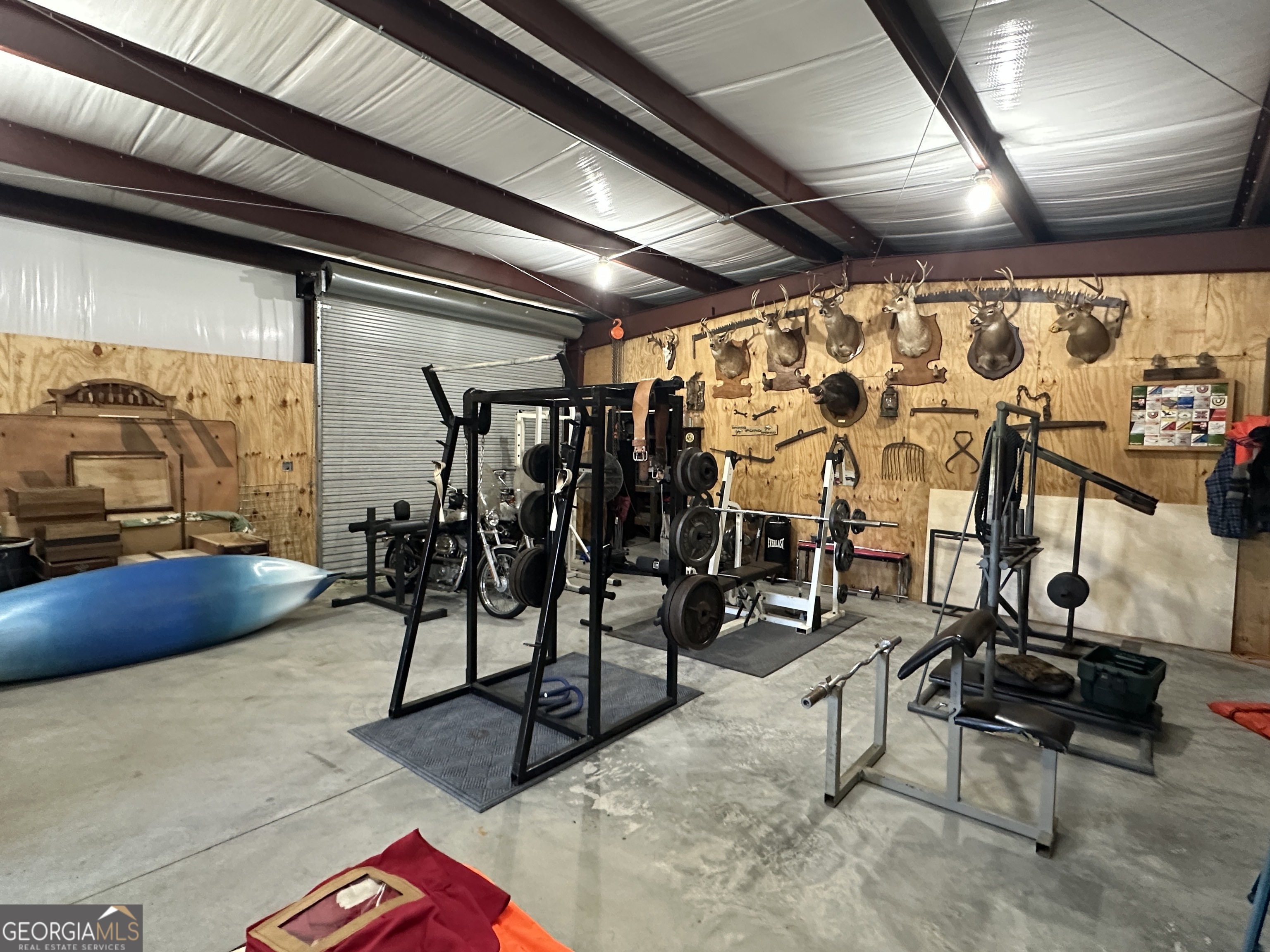 208 Oak Grove Lane Sylvania, GA 30467 - Photo 22 of 31 a view of a room with gym equipment