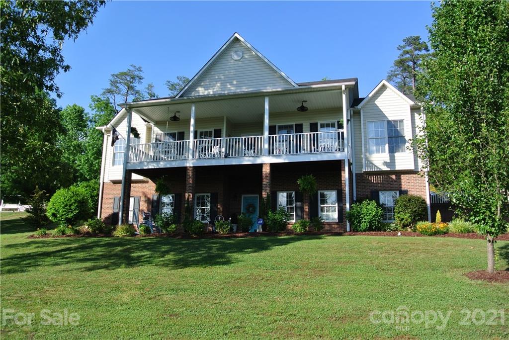 1911 Coxe Road Rutherfordton, NC 28139 - Photo 2 of 37 a front view of a house with a yard