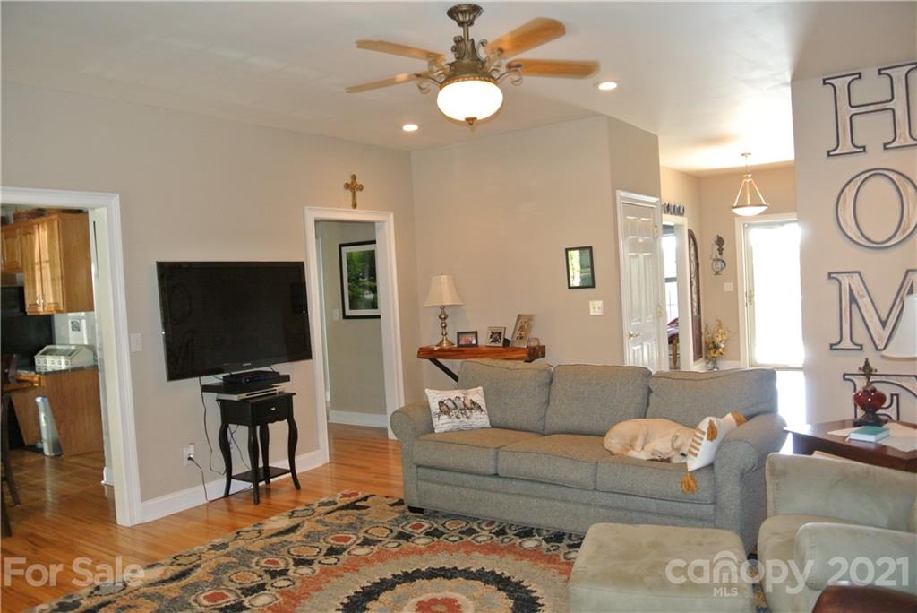 1911 Coxe Road Rutherfordton, NC 28139 - Photo 13 of 37 a living room with furniture and a flat screen tv