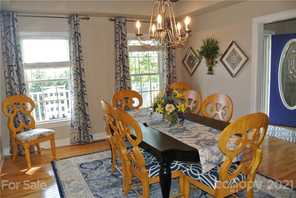 1911 Coxe Road Rutherfordton, NC 28139 - Photo 15 of 37 a view of a dining room with furniture and chandelier
