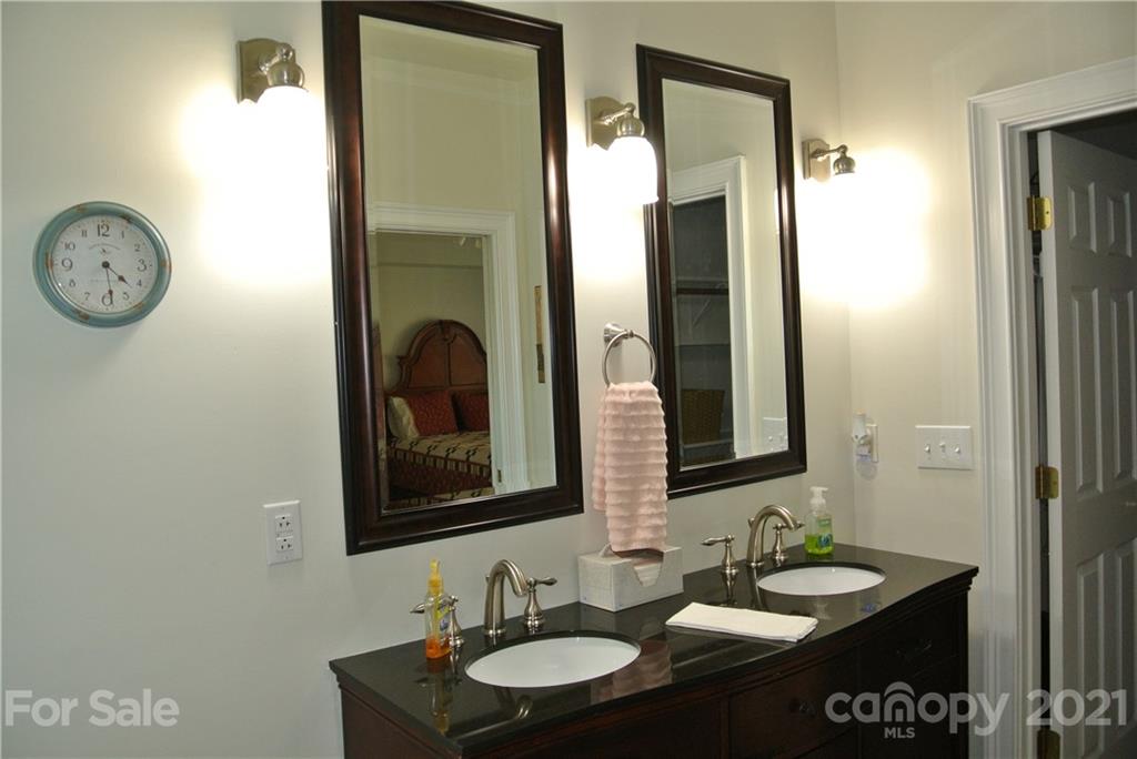 1911 Coxe Road Rutherfordton, NC 28139 - Photo 23 of 37 a bathroom with a sink and a mirror