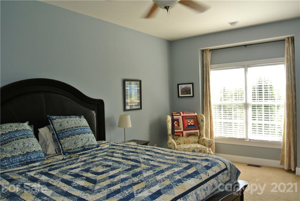 1911 Coxe Road Rutherfordton, NC 28139 - Photo 28 of 37 a bedroom with a bed and a window