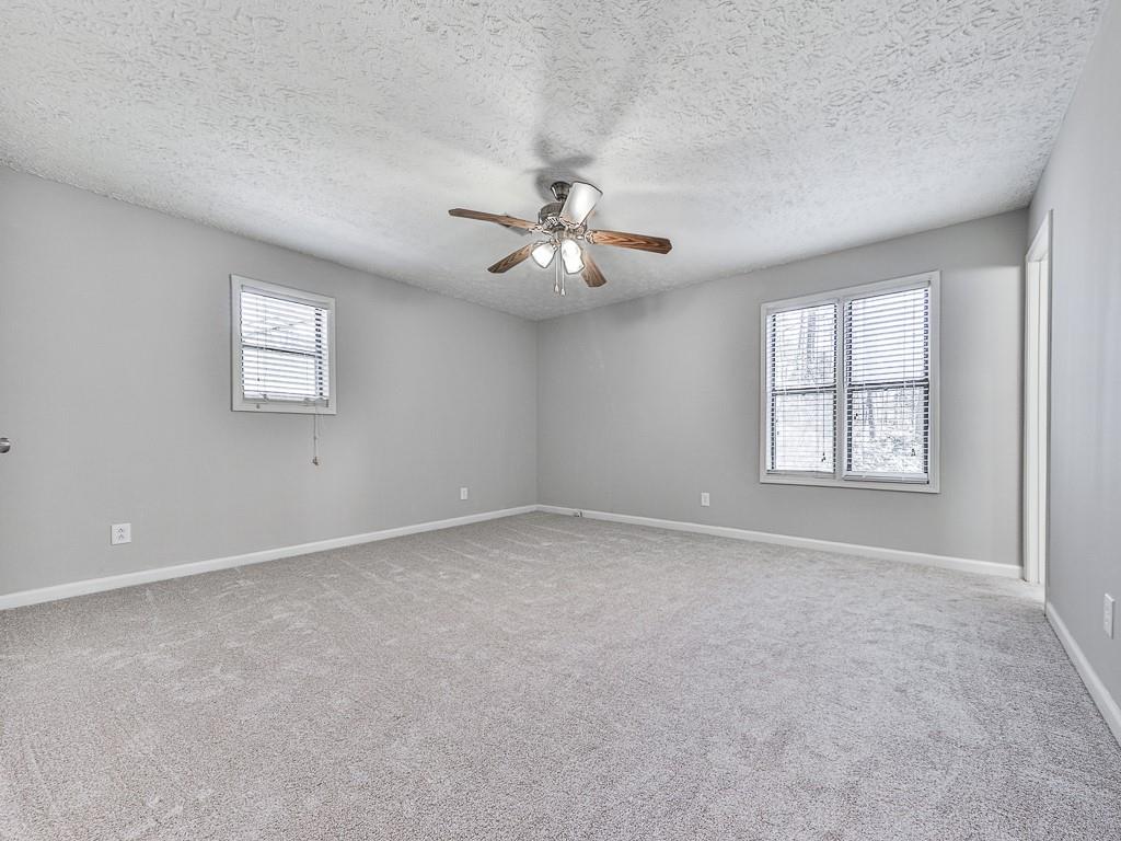 5506 Vaughn Road Woodstock, GA 30188 - Photo 19 of 33 a view of an empty room with a window