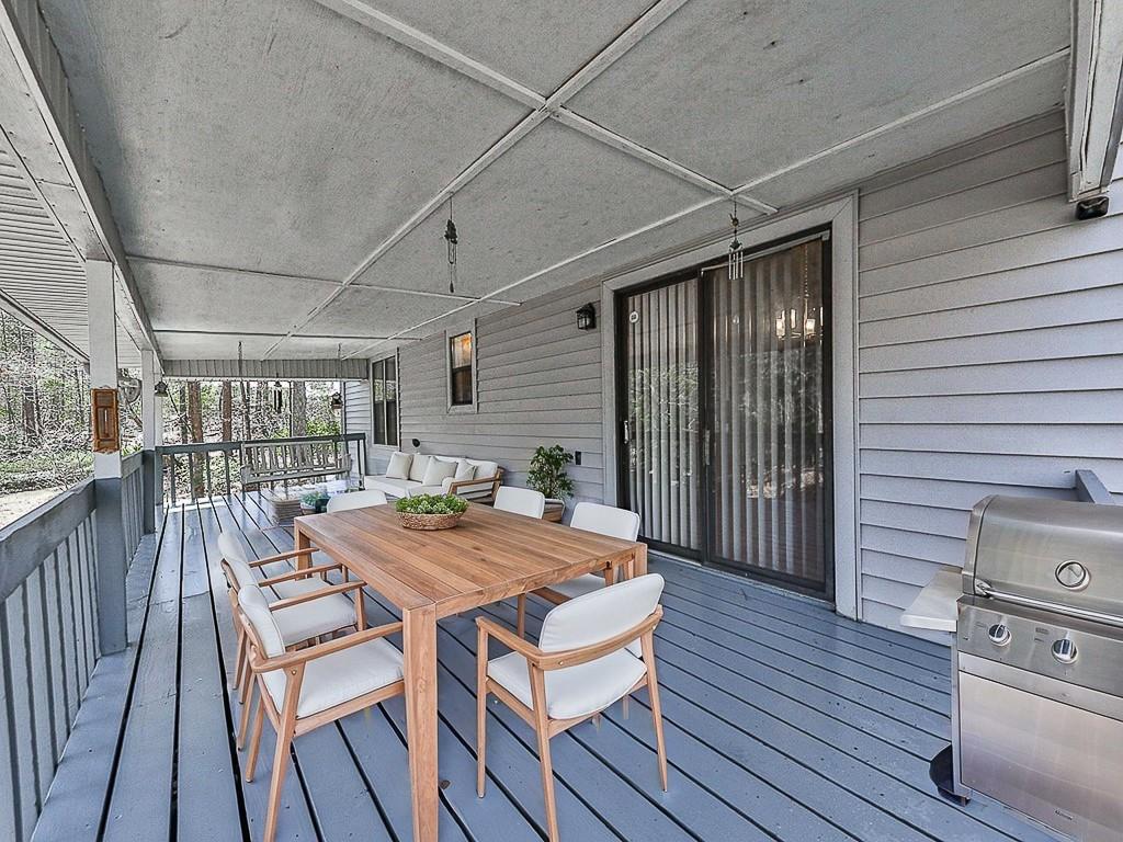 5506 Vaughn Road Woodstock, GA 30188 - Photo 32 of 33 a outdoor space with a wooden floor