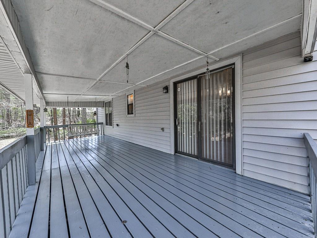 5506 Vaughn Road Woodstock, GA 30188 - Photo 33 of 33 a view of a balcony with wooden floor