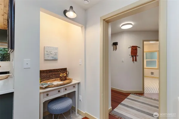 a view of entryway with wooden floor