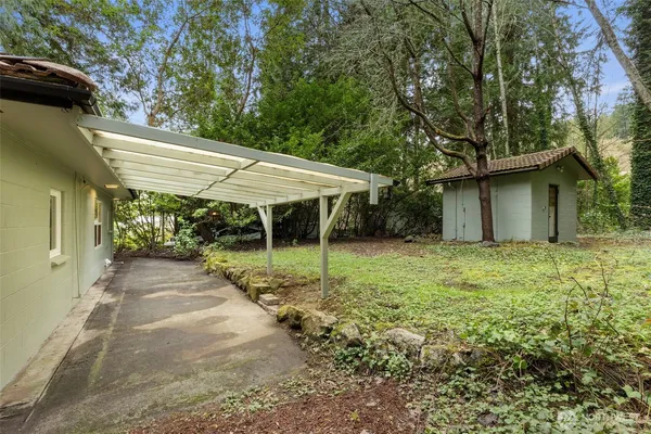 a house with trees in the background