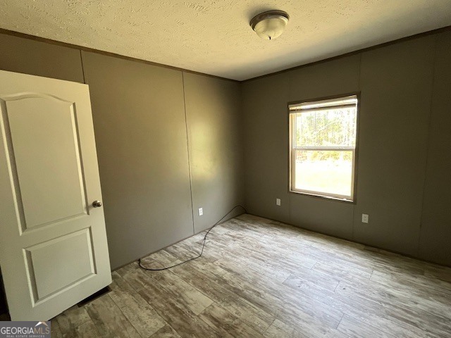 26 Ebenezer Church Road Swainsboro, GA 30401 - Photo 11 of 11 an empty room with windows