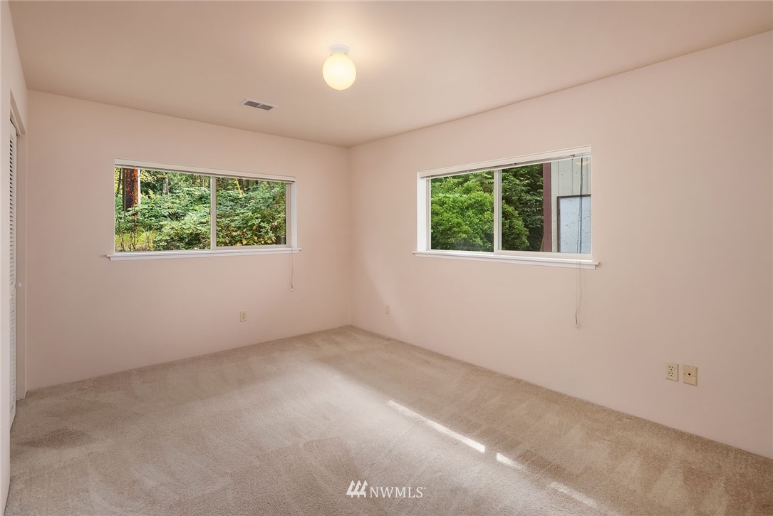 19115 Southeast 128th Street Renton, WA 98059 - Photo 15 of 21 an empty room with a window