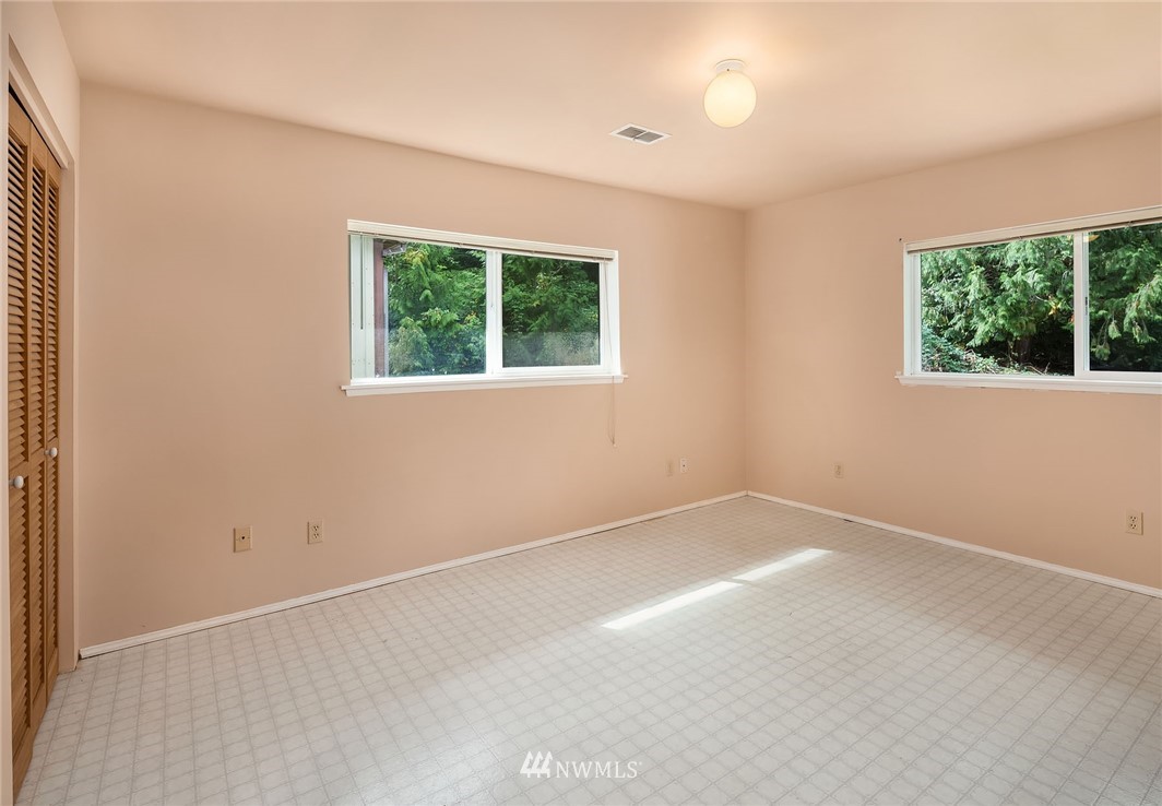 19115 Southeast 128th Street Renton, WA 98059 - Photo 16 of 21 an empty room with windows