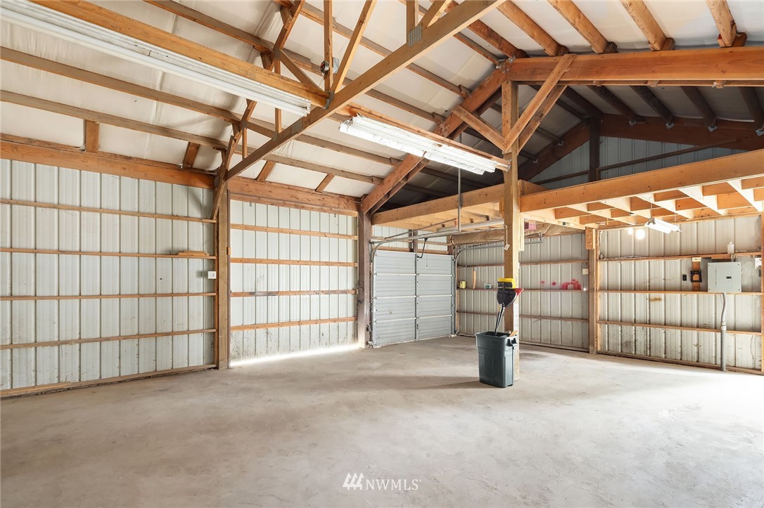 19115 Southeast 128th Street Renton, WA 98059 - Photo 19 of 21 a view of empty room with wooden walls