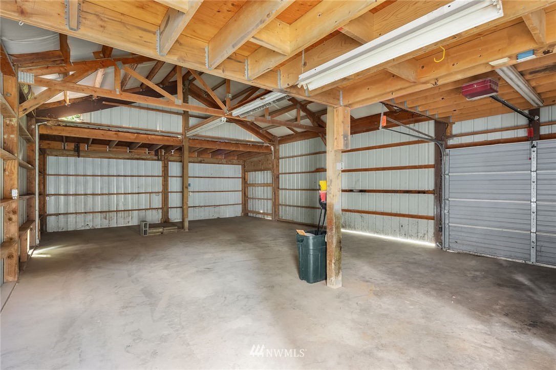 19115 Southeast 128th Street Renton, WA 98059 - Photo 20 of 21 a view of a garage room with washing machine
