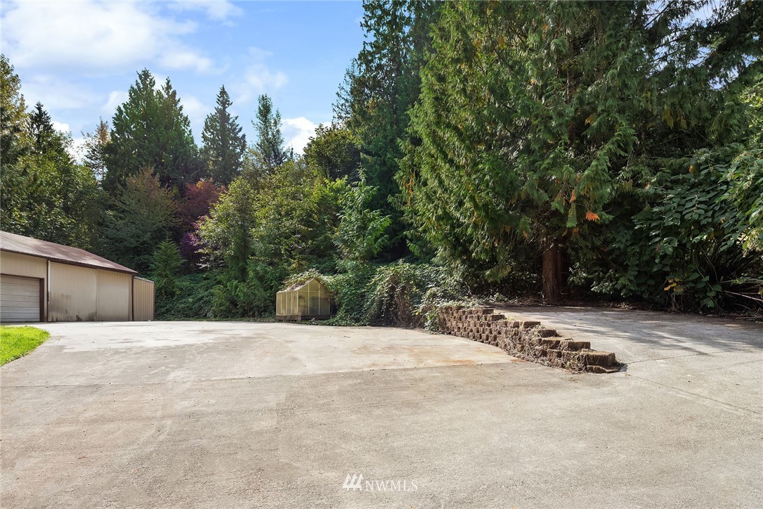 19115 Southeast 128th Street Renton, WA 98059 - Photo 21 of 21 a view of a park with large trees