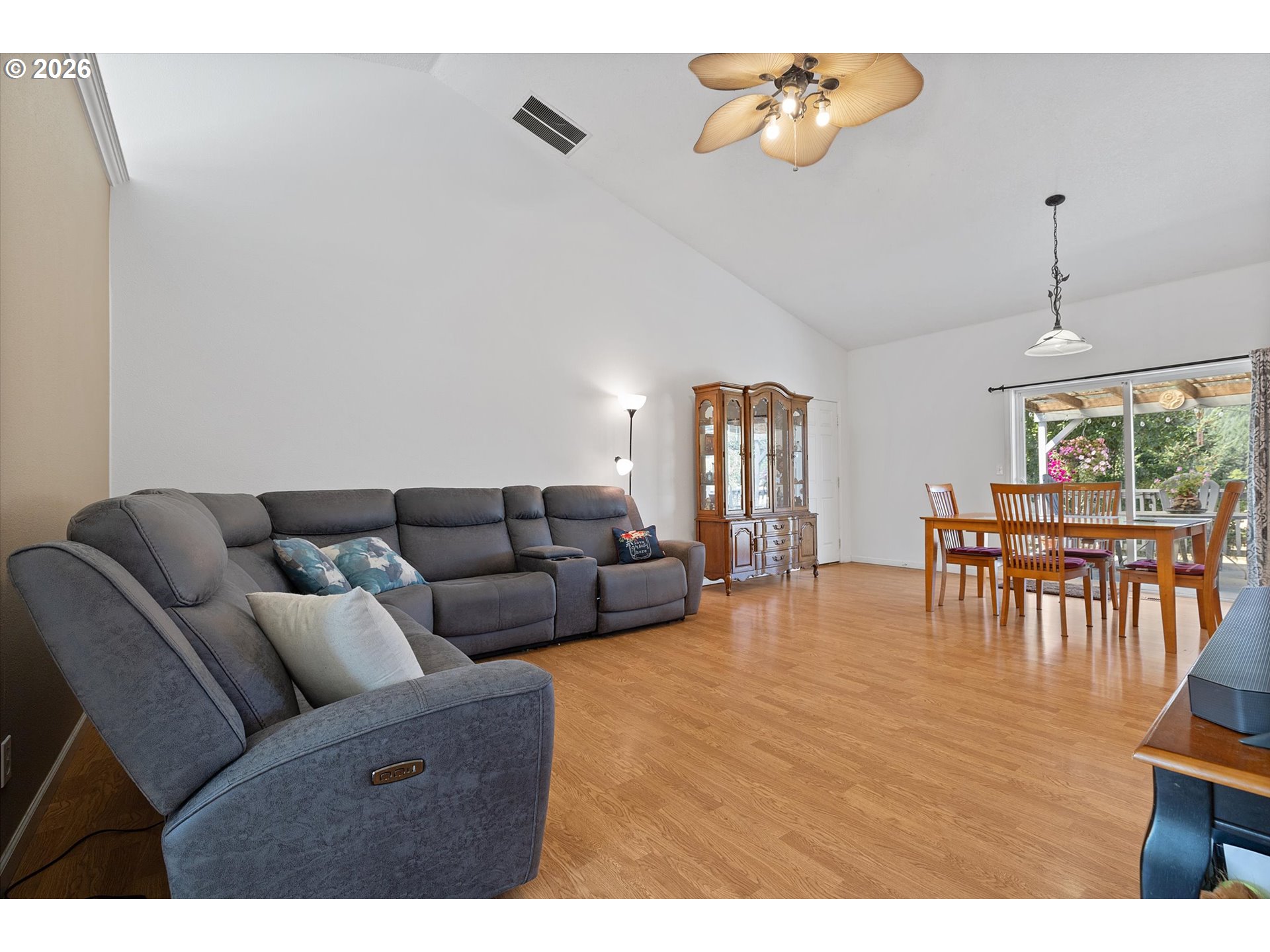 23455 Northeast Spring Hill Road Gaston, OR 97119 - Photo 10 of 48 a living room with furniture and a dining table