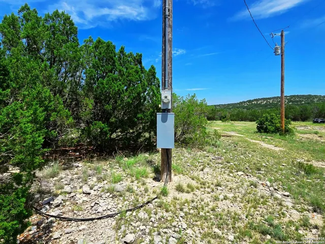 a fire hydrant in the middle of a field