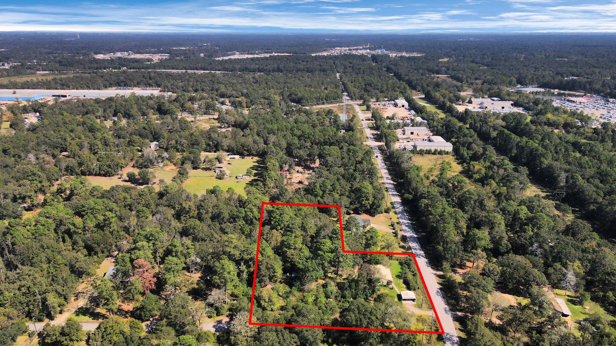 3014 Ave M Conroe, TX 77301 - Photo 5 of 12 an aerial view of residential houses with outdoor space