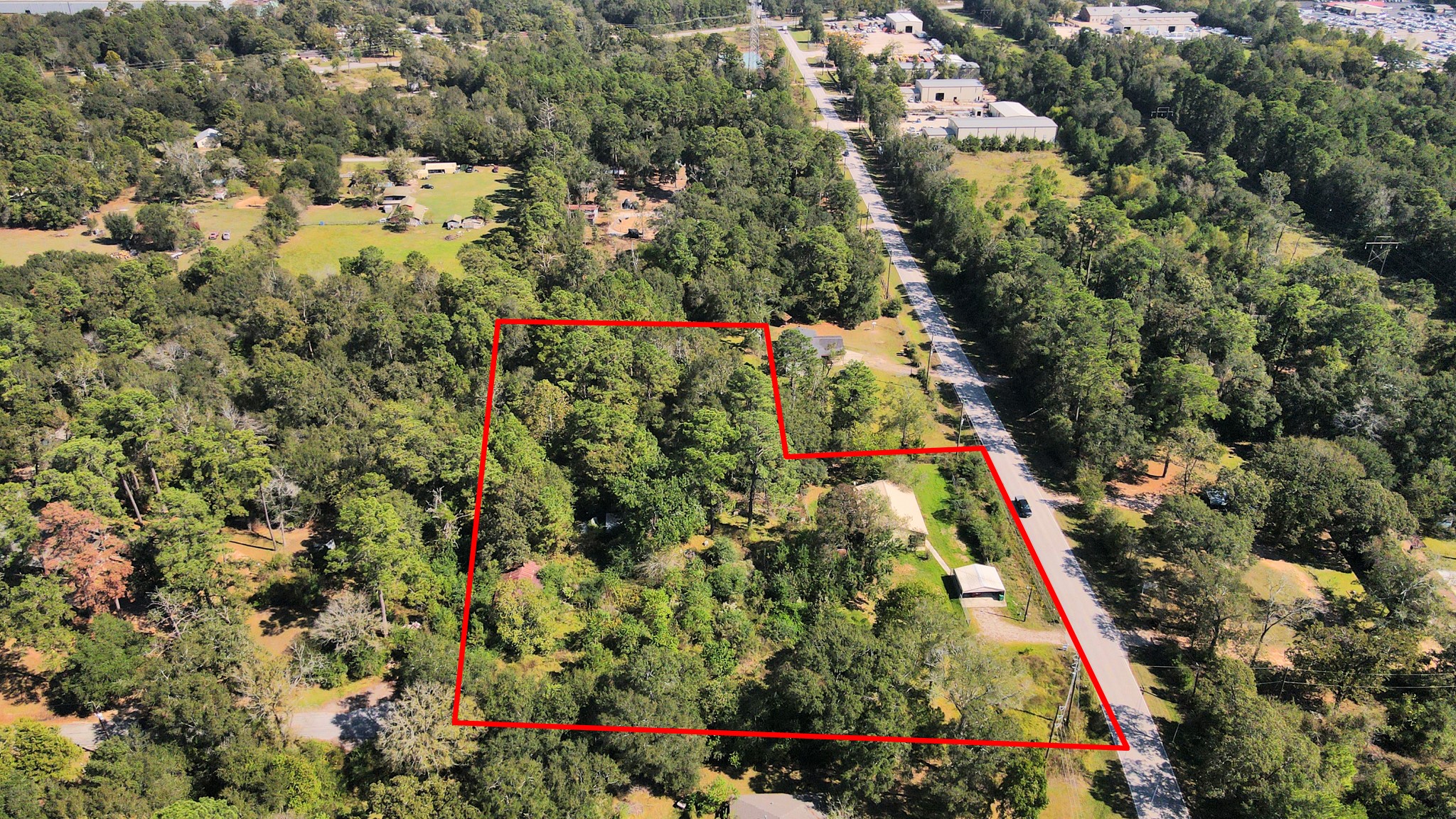 3014 Ave M Conroe, TX 77301 - Photo 6 of 12 an aerial view of residential houses with outdoor space
