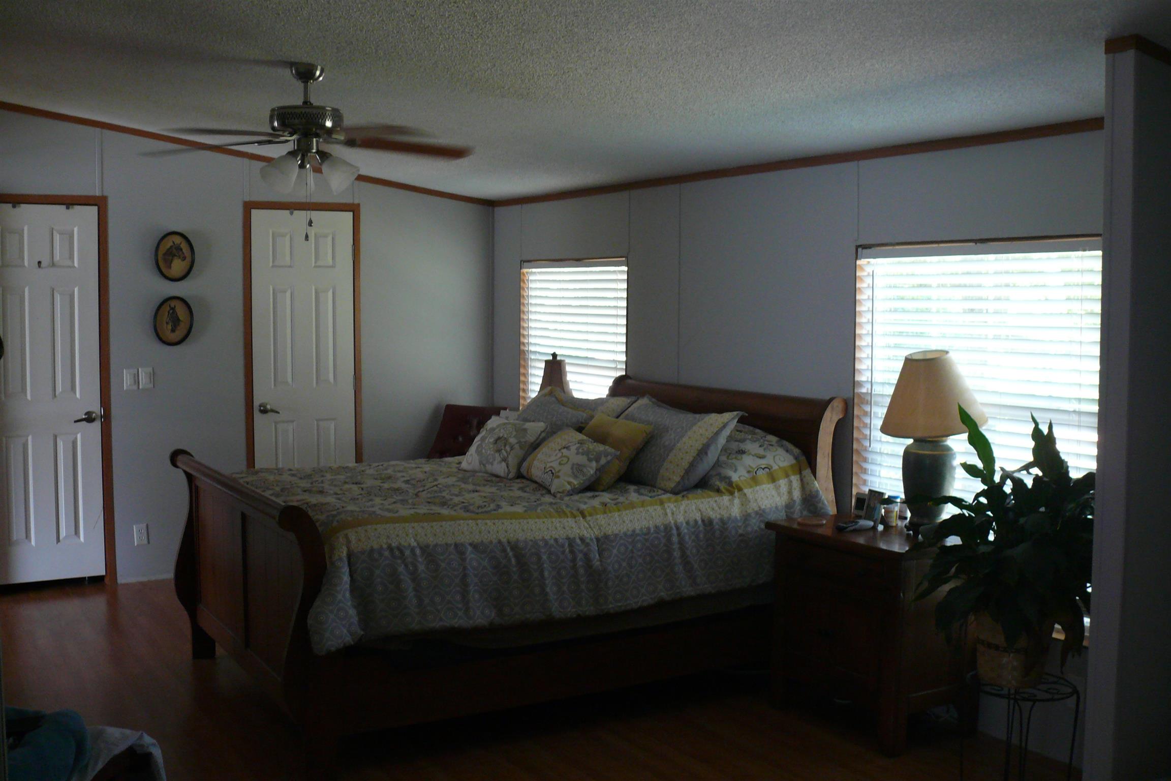 400 Jesse Work Road Dickson, TN 37055 - Photo 4 of 9 a bedroom with a bed table and a window