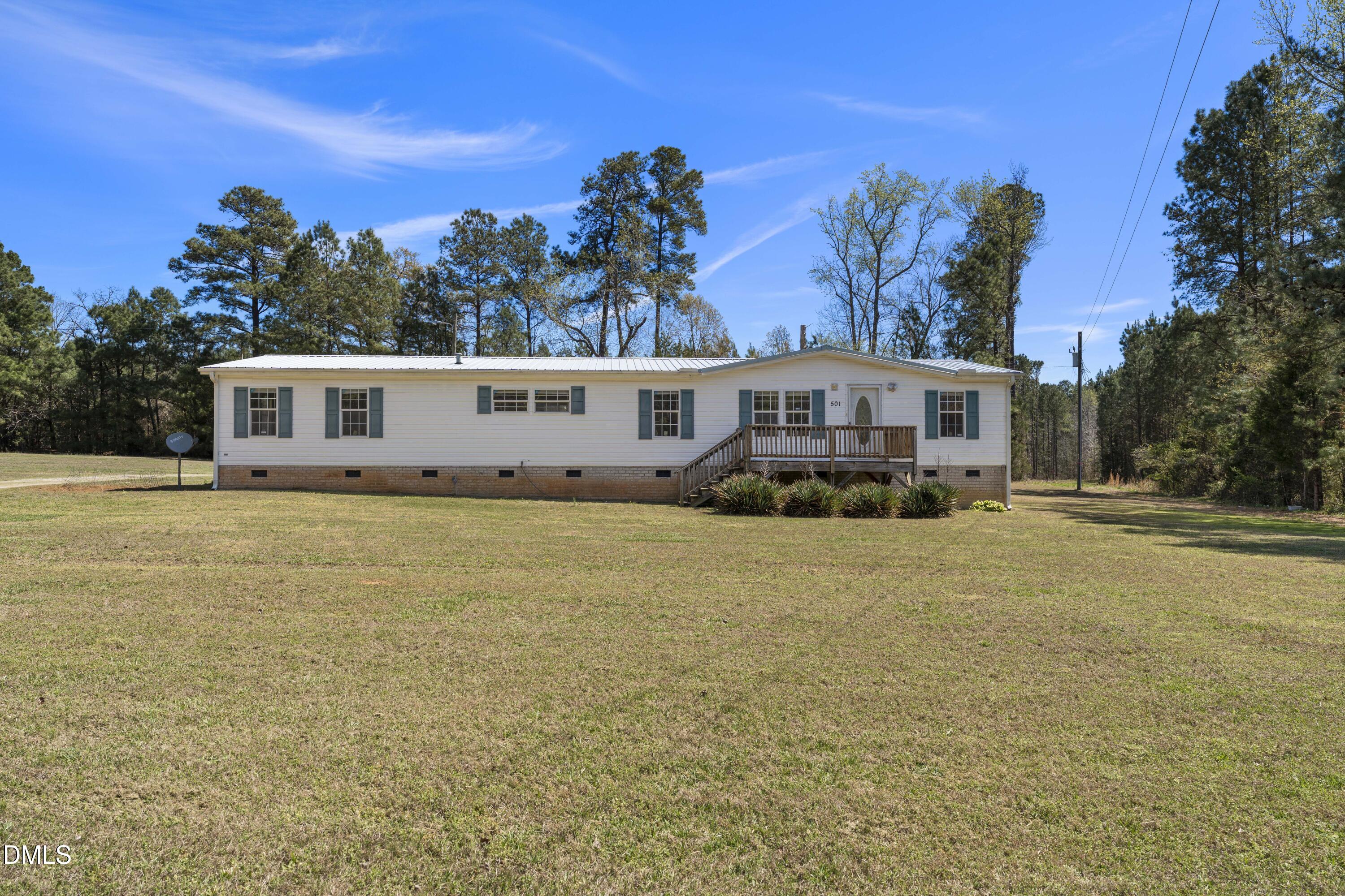 501 Macon-Embro Road Macon, NC 27551 - Photo 1 of 37 a view of a house with swimming pool