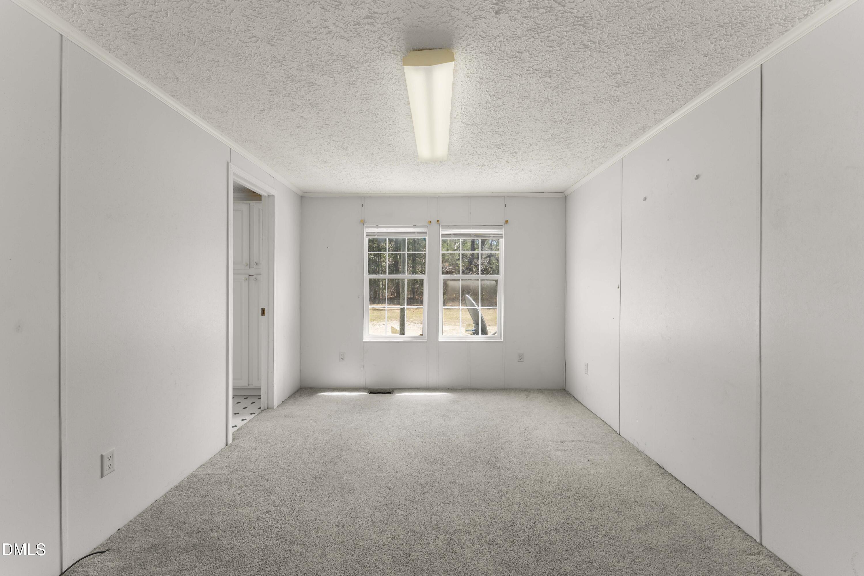 501 Macon-Embro Road Macon, NC 27551 - Photo 22 of 37 a view of a room that has a window in it