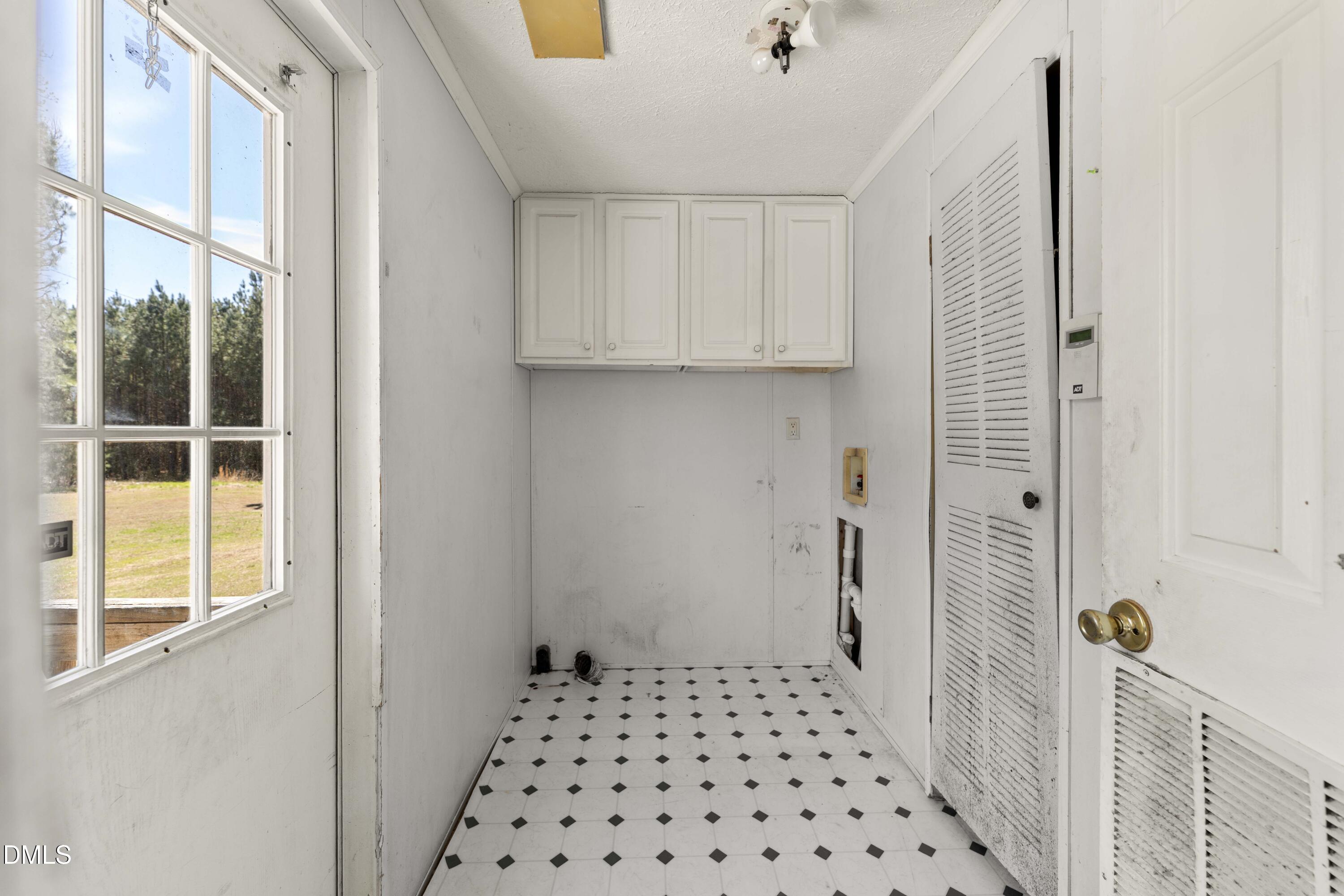 501 Macon-Embro Road Macon, NC 27551 - Photo 23 of 37 a bathroom with a sink and a shower