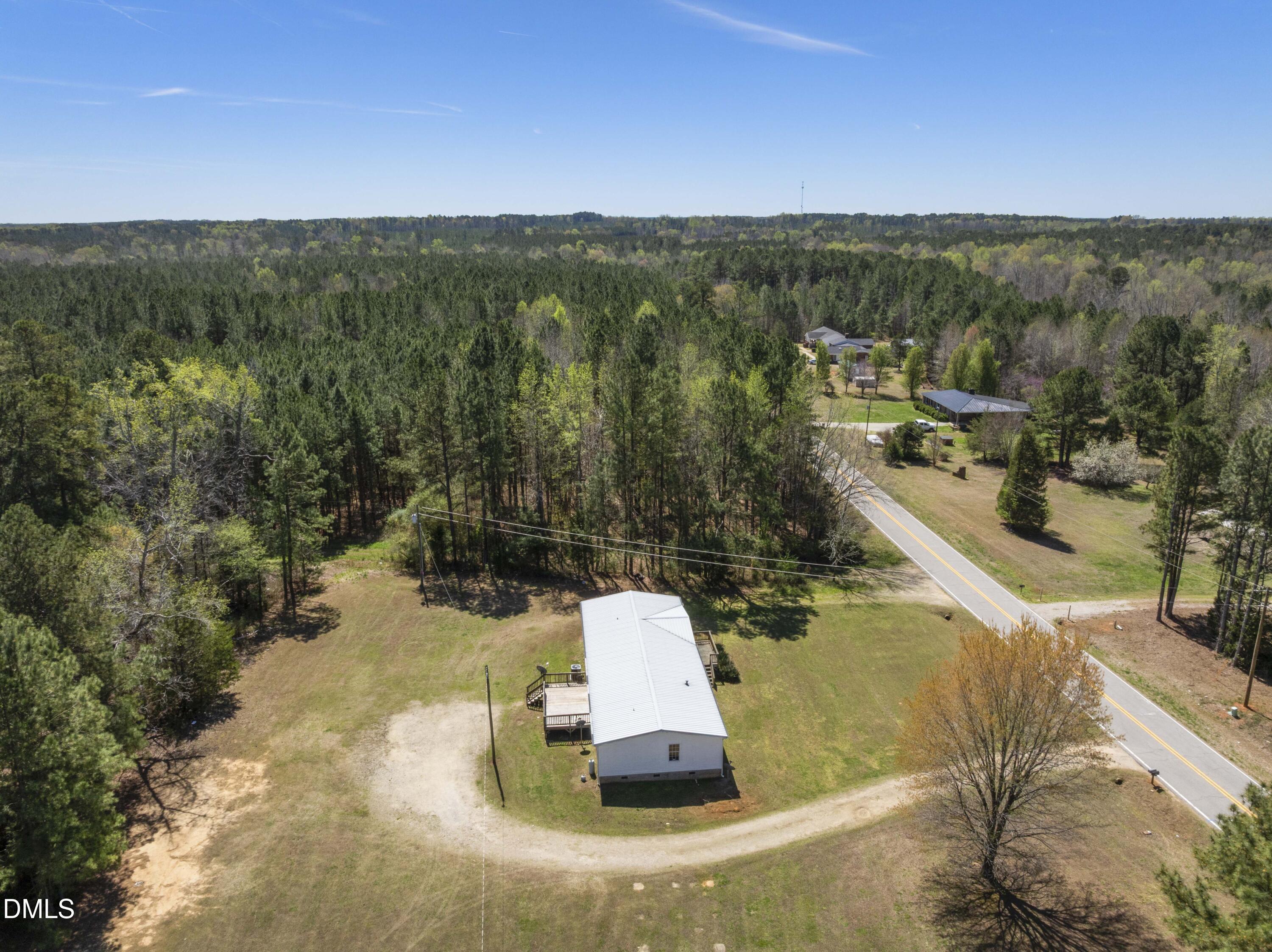 501 Macon-Embro Road Macon, NC 27551 - Photo 26 of 37 a view of a swimming pool with a yard