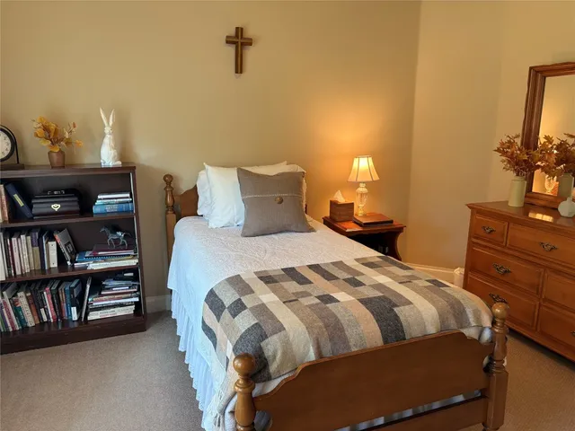 a front view of house with yard and swimming pool