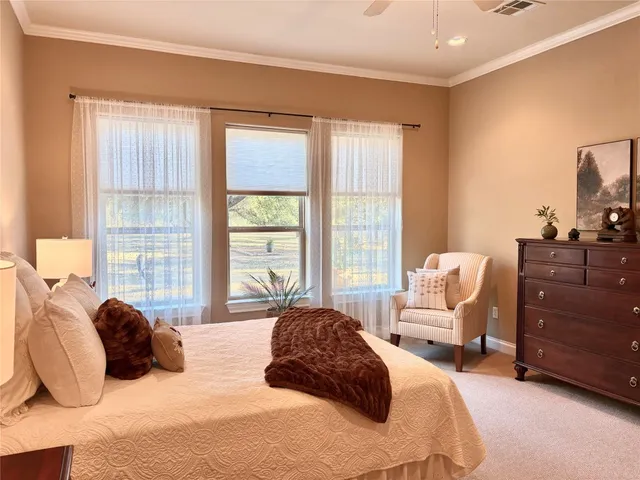 a bathroom with a tub and shower