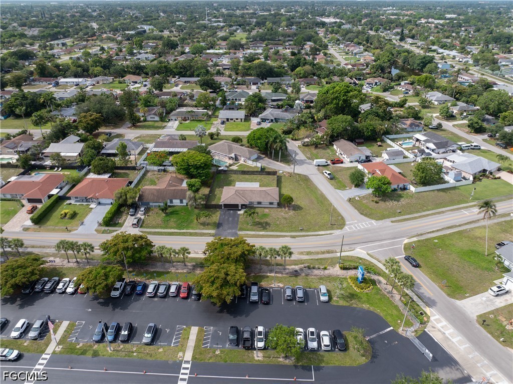 4960 20th Place Southwest Naples, FL 34116 - Photo 32 of 33 an aerial view of residential houses with outdoor space