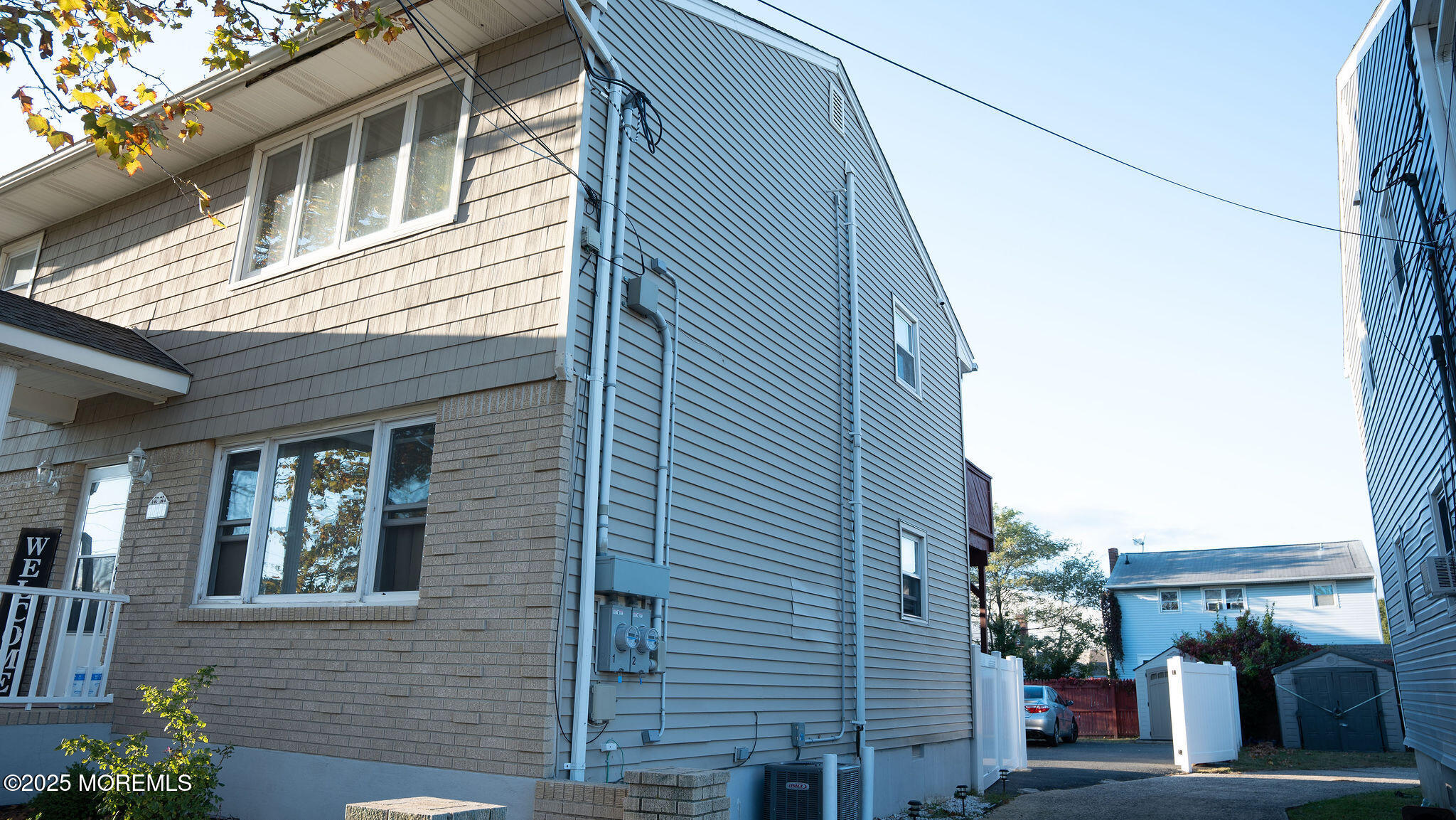73 Maple Avenue, Unit 2 Keansburg, NJ 07734 - Photo 4 of 33 a view of a house with a street