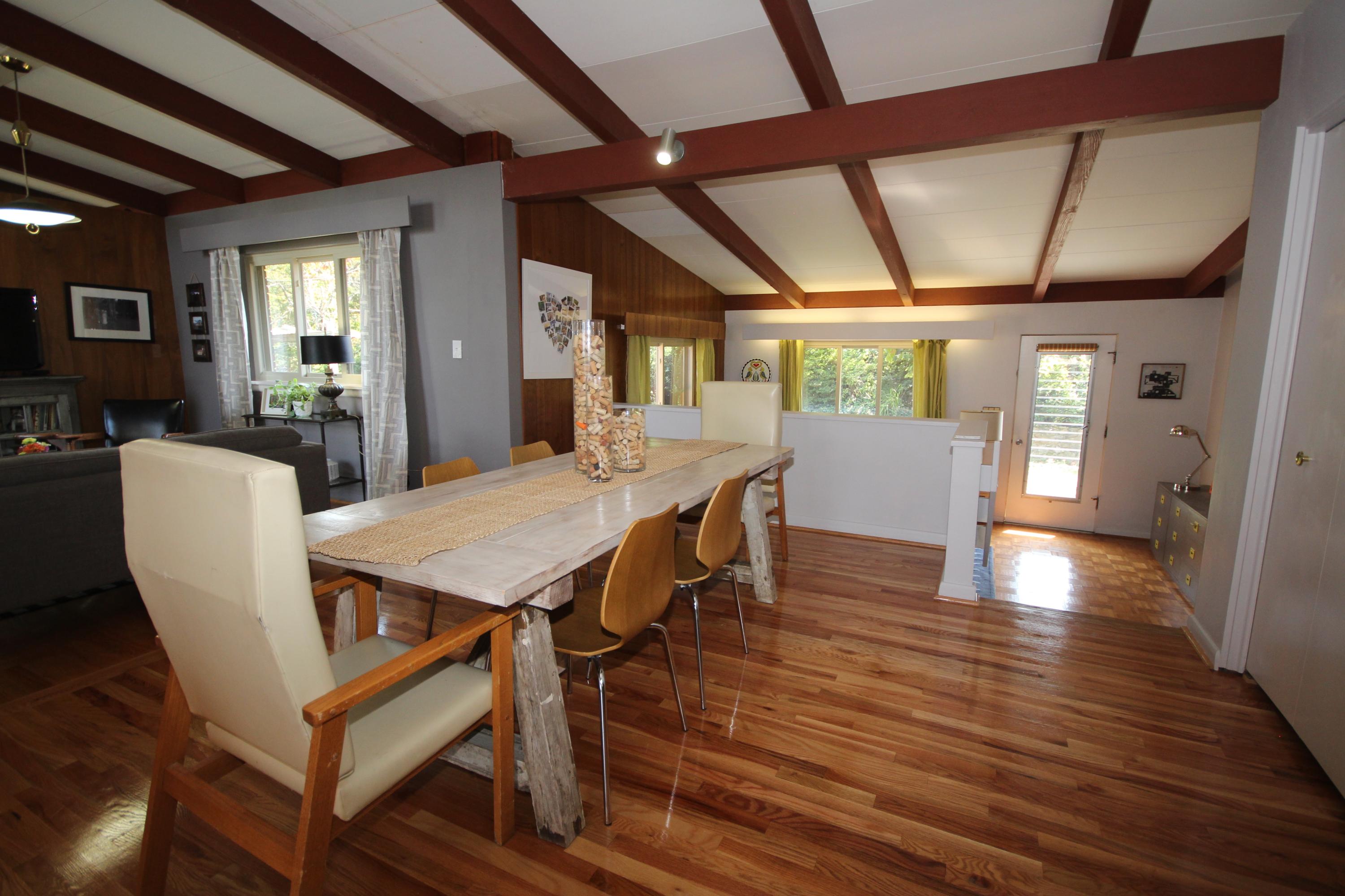 4507 Rosecrest Road Roanoke, VA 24018 - Photo 14 of 41 a view of a dining room with furniture window and wooden floor
