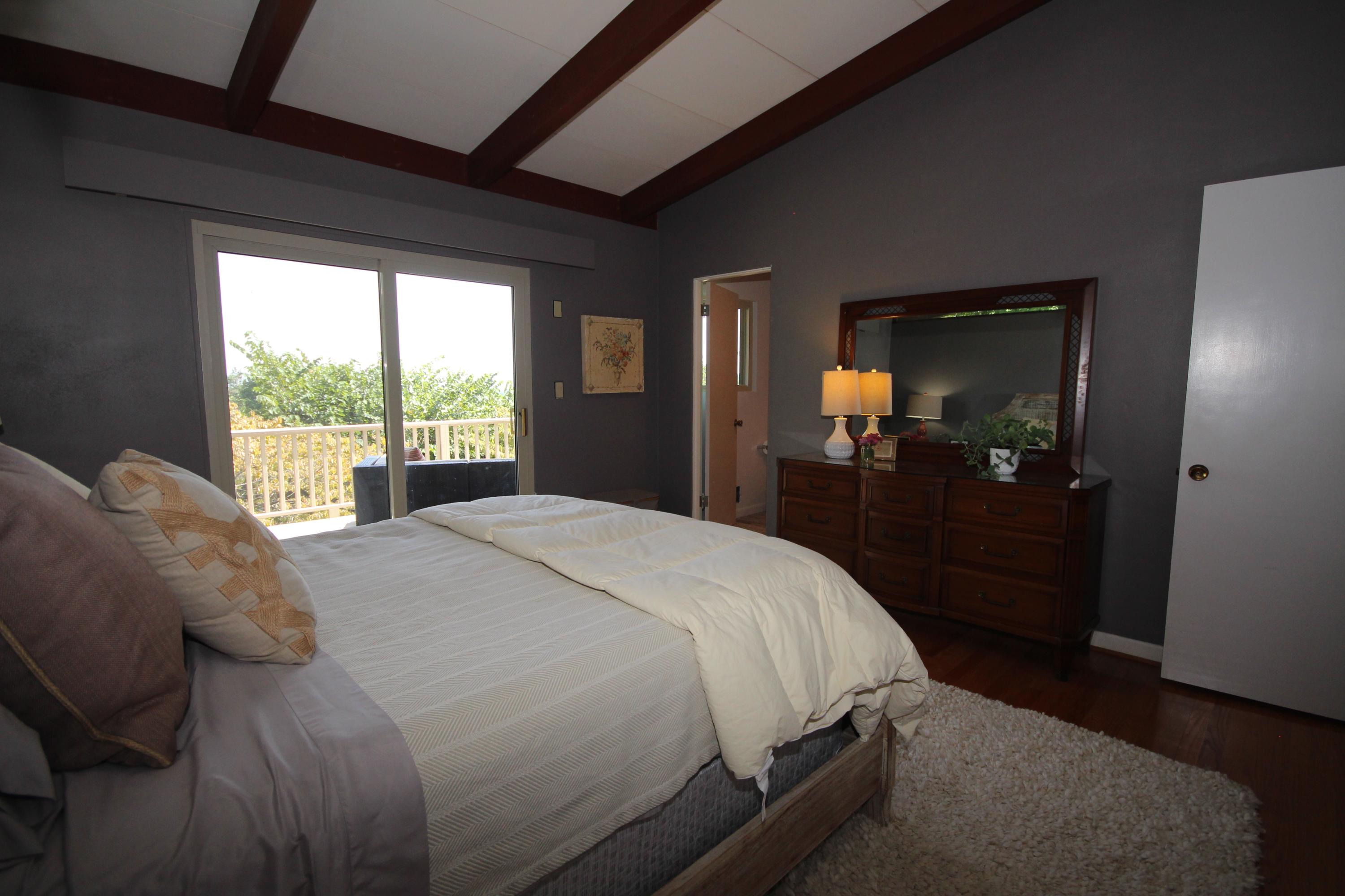 4507 Rosecrest Road Roanoke, VA 24018 - Photo 25 of 41 a bedroom with a large bed and a large window