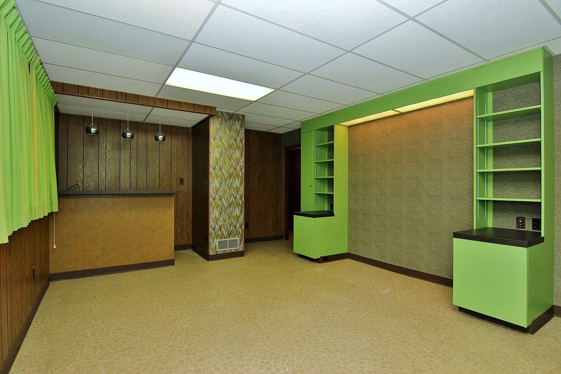 4507 Rosecrest Road Roanoke, VA 24018 - Photo 30 of 41 a view of an empty room with a kitchen