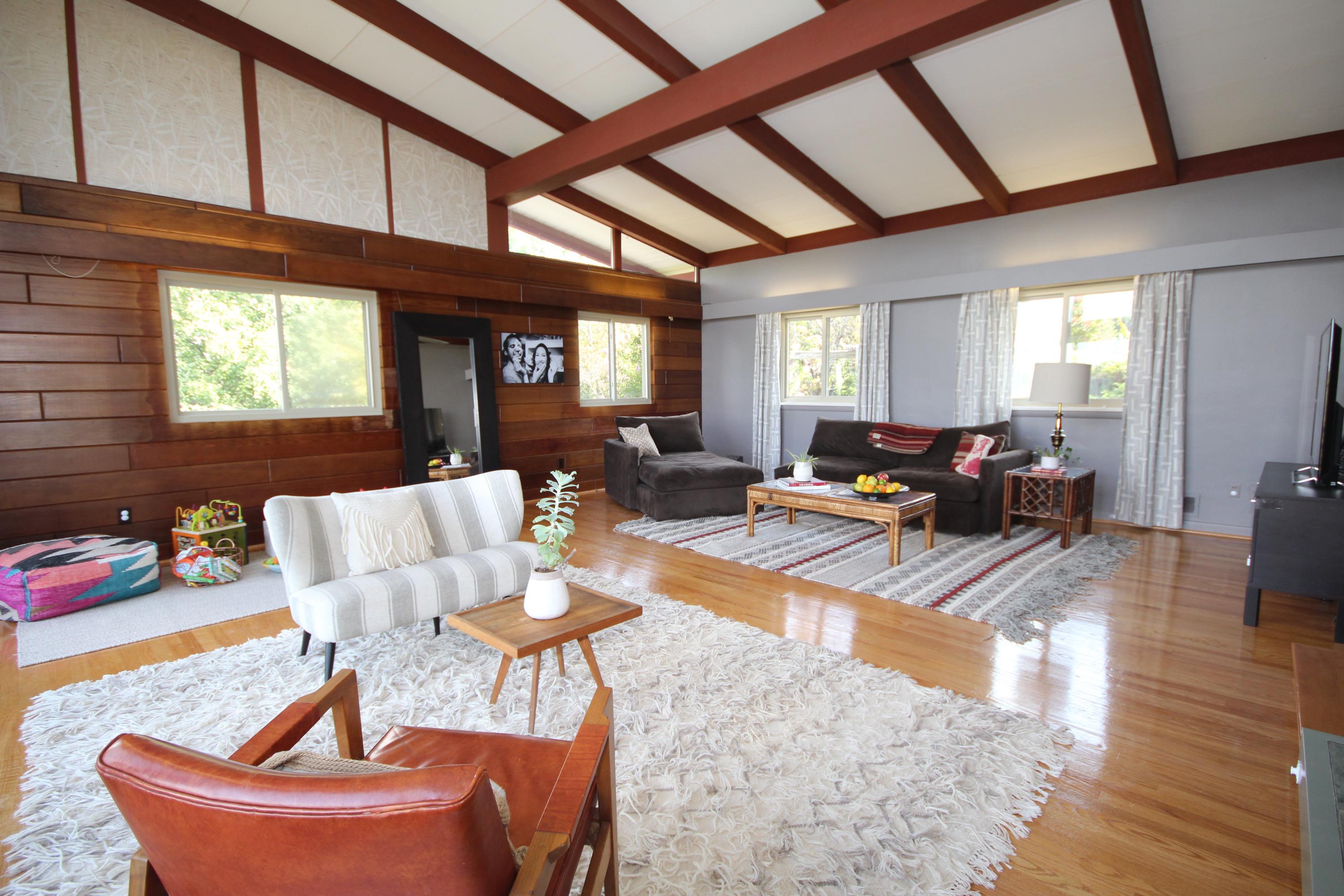 4507 Rosecrest Road Roanoke, VA 24018 - Photo 7 of 41 a living room with furniture a fireplace and a large window