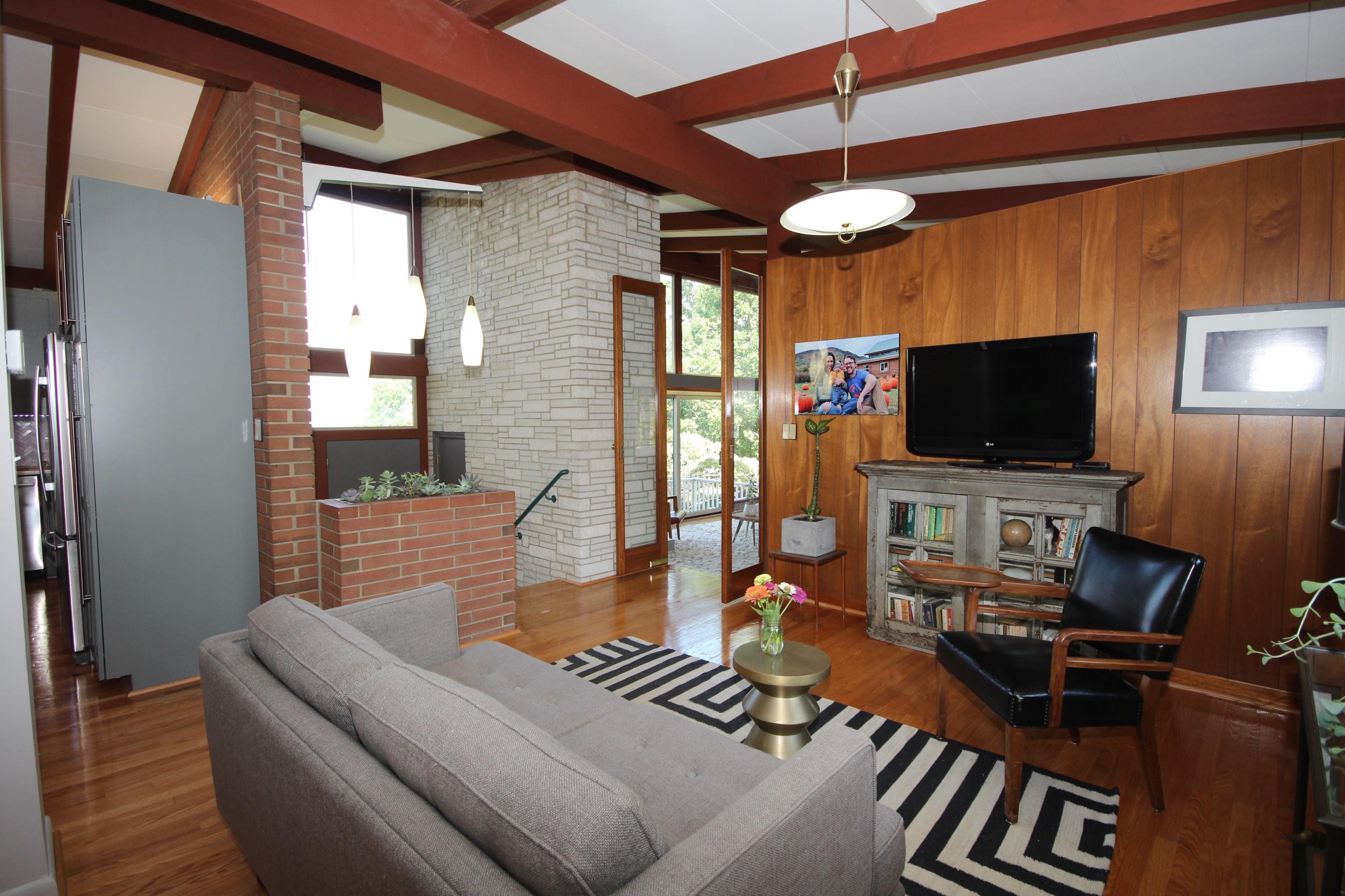 4507 Rosecrest Road Roanoke, VA 24018 - Photo 10 of 41 a living room with furniture and a flat screen tv
