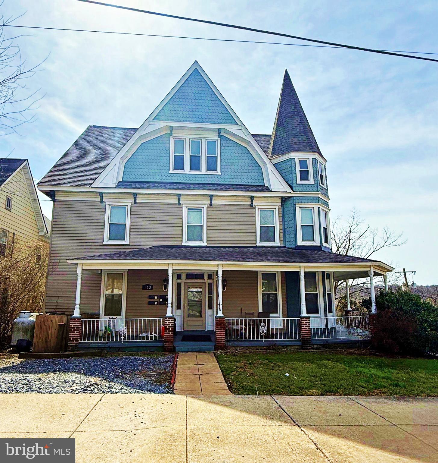102 East A Street Brunswick, MD 21716 - Photo 2 of 18 a front view of a house with garden