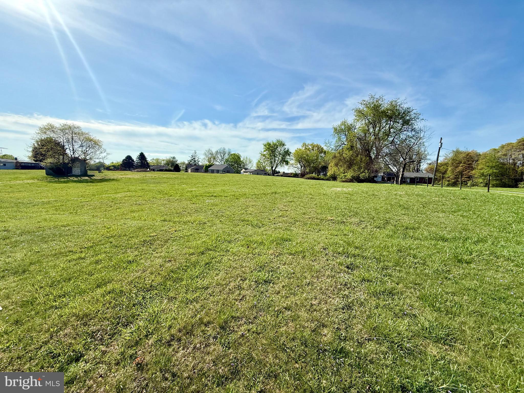 7131 Bowers Road Frederick, MD 21702 - Photo 6 of 26 a view of a field of grass and trees