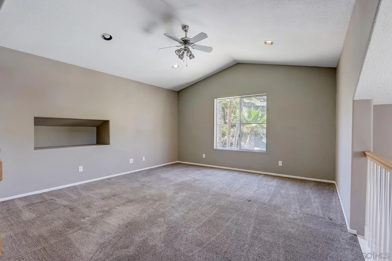 4824 Contour Court Oceanside, CA 92057 - Photo 12 of 32 an empty room with windows and ceiling fan
