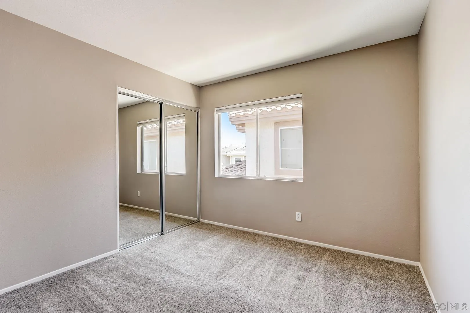 4824 Contour Court Oceanside, CA 92057 - Photo 16 of 32 a view of an empty room with window