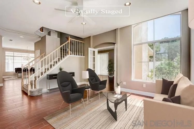 4824 Contour Court Oceanside, CA 92057 - Photo 2 of 32 a living room with furniture and wooden floor