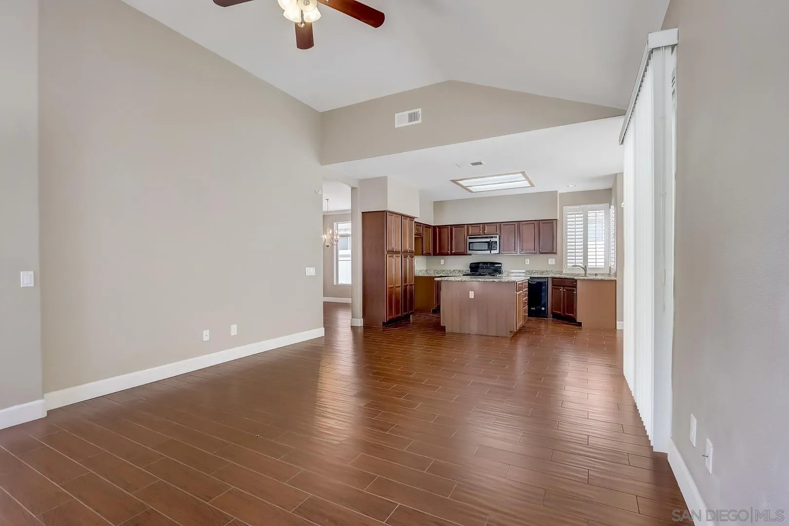 4824 Contour Court Oceanside, CA 92057 - Photo 23 of 32 a view of kitchen and living room