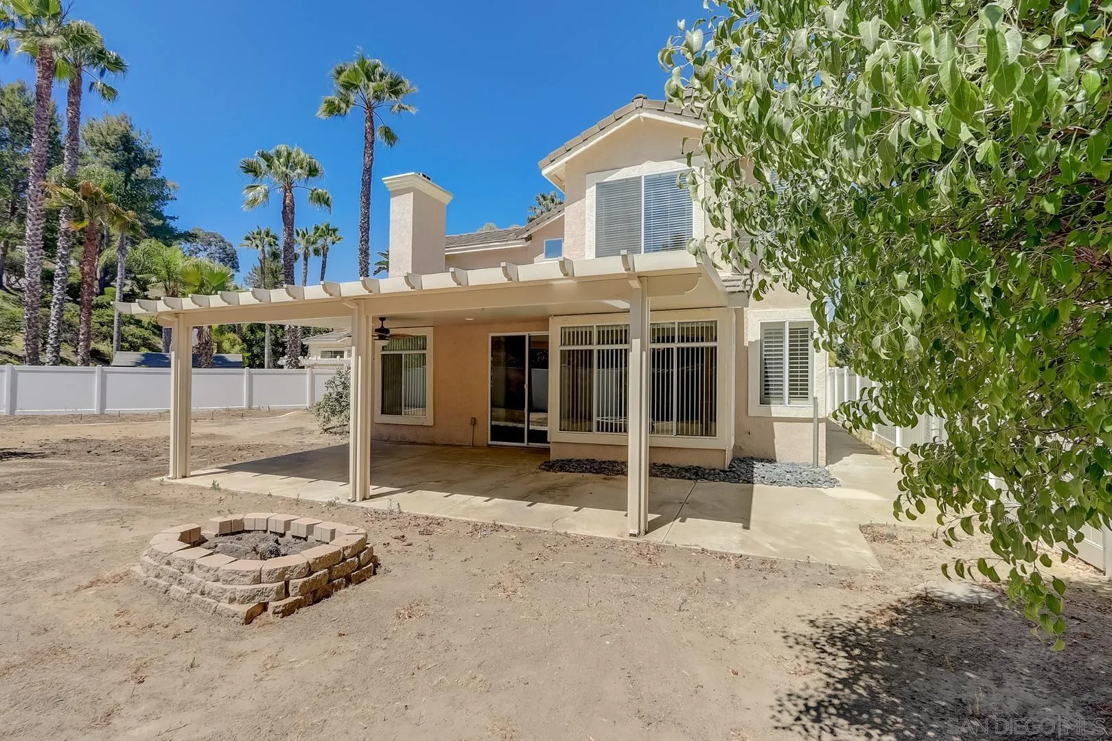 4824 Contour Court Oceanside, CA 92057 - Photo 31 of 32 a front view of a house with a yard and garage