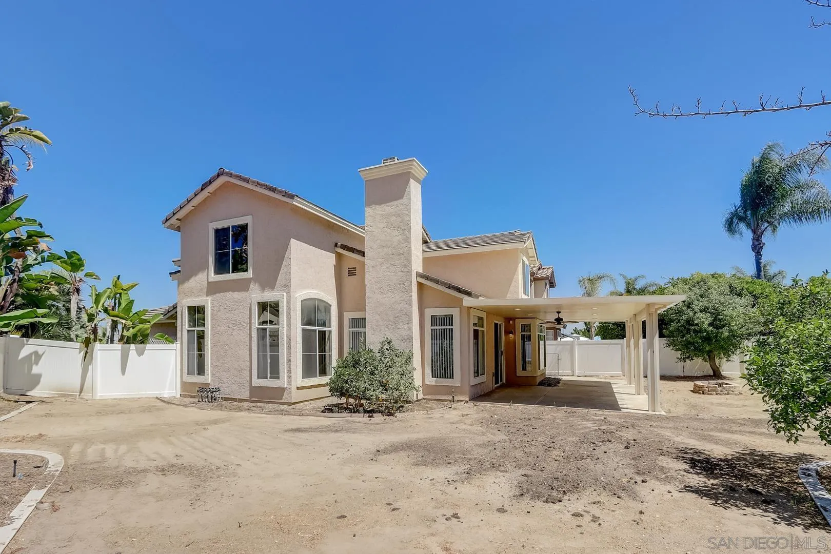 4824 Contour Court Oceanside, CA 92057 - Photo 32 of 32 a front view of a house with a yard and garage