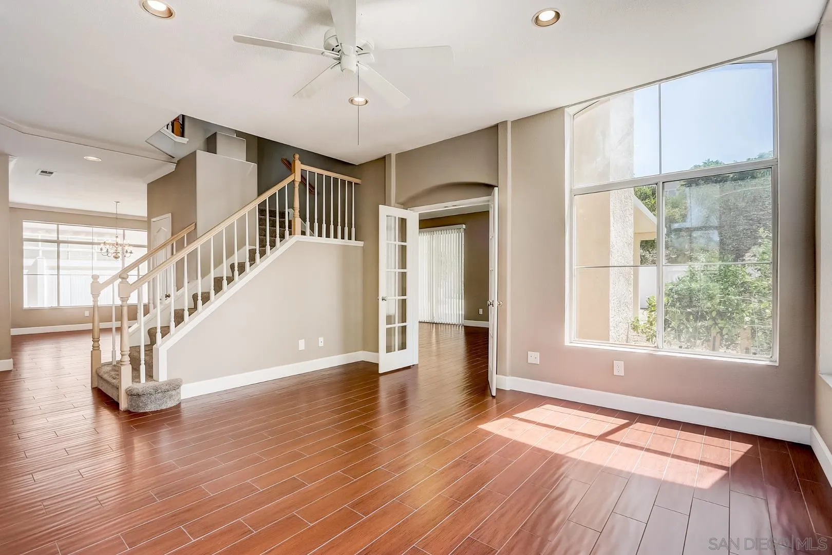 4824 Contour Court Oceanside, CA 92057 - Photo 6 of 32 a view of an entryway with wooden floor and windows