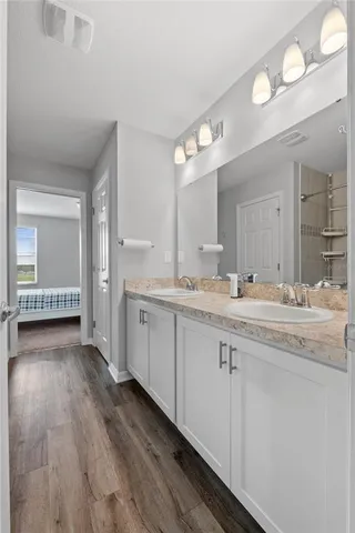 a view of a house with brick walls