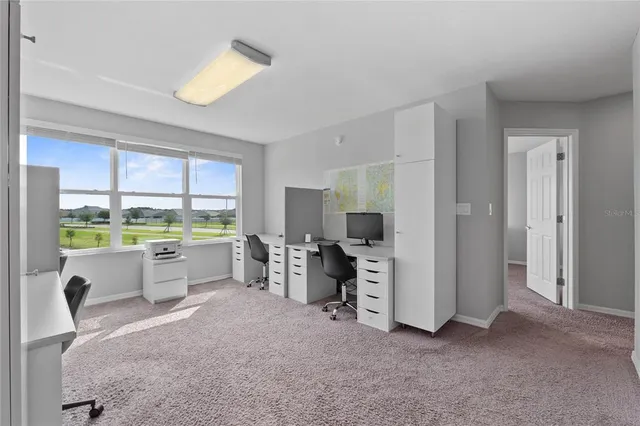 a view of a lake with a big yard