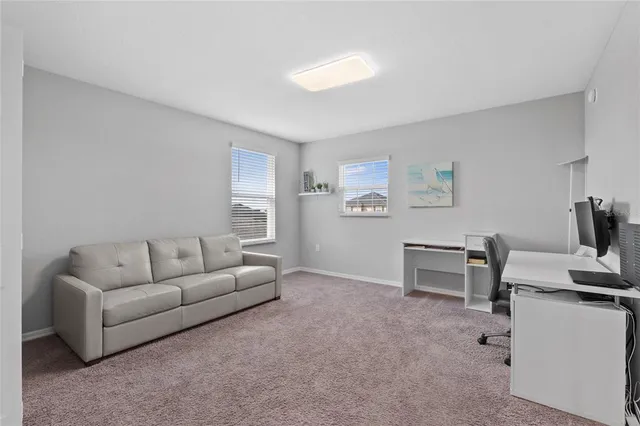 an aerial view of a house with a garden